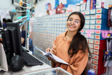 teen girl working in a shop