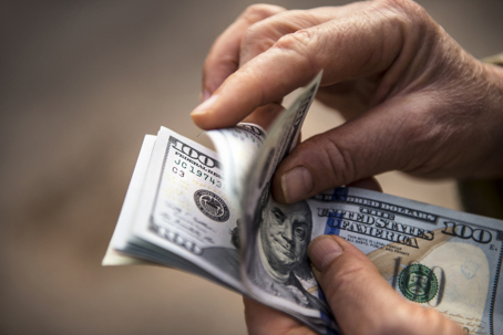 person counting money